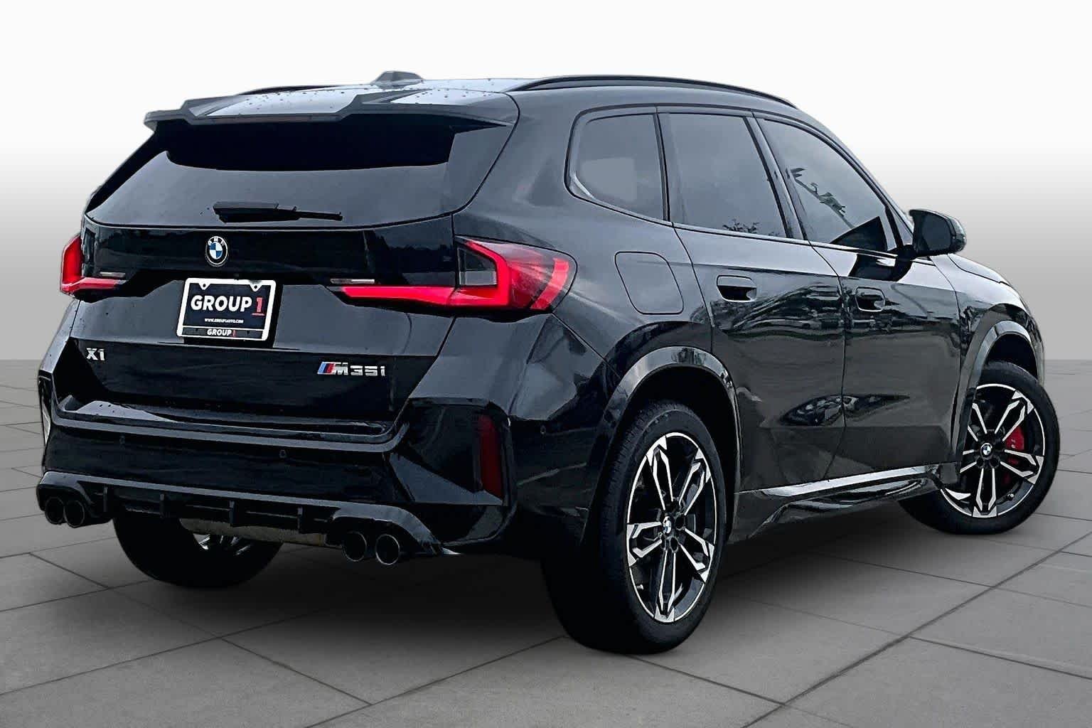 Used 2024 Black Sapphire Metallic BMW M35i image 12