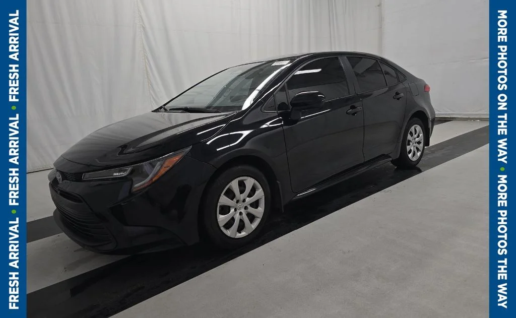 Used 2024 Black Toyota LE image 1