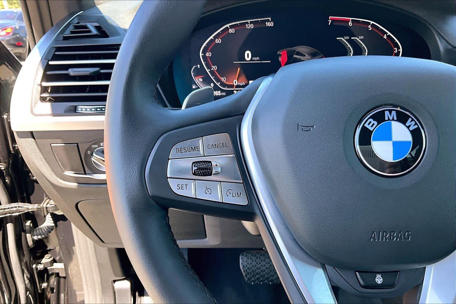 Used 2024 Black Sapphire Metallic BMW xDrive30i image 22