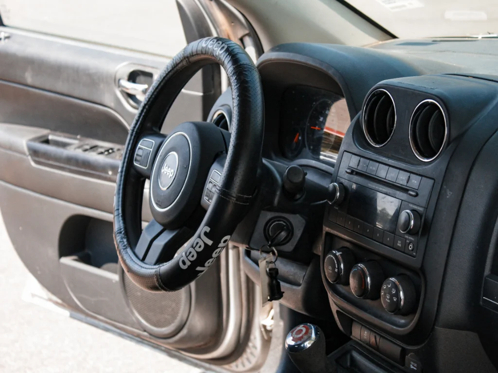 Used 2012 Bright Silver Metallic Clearcoat Jeep Sport image 22