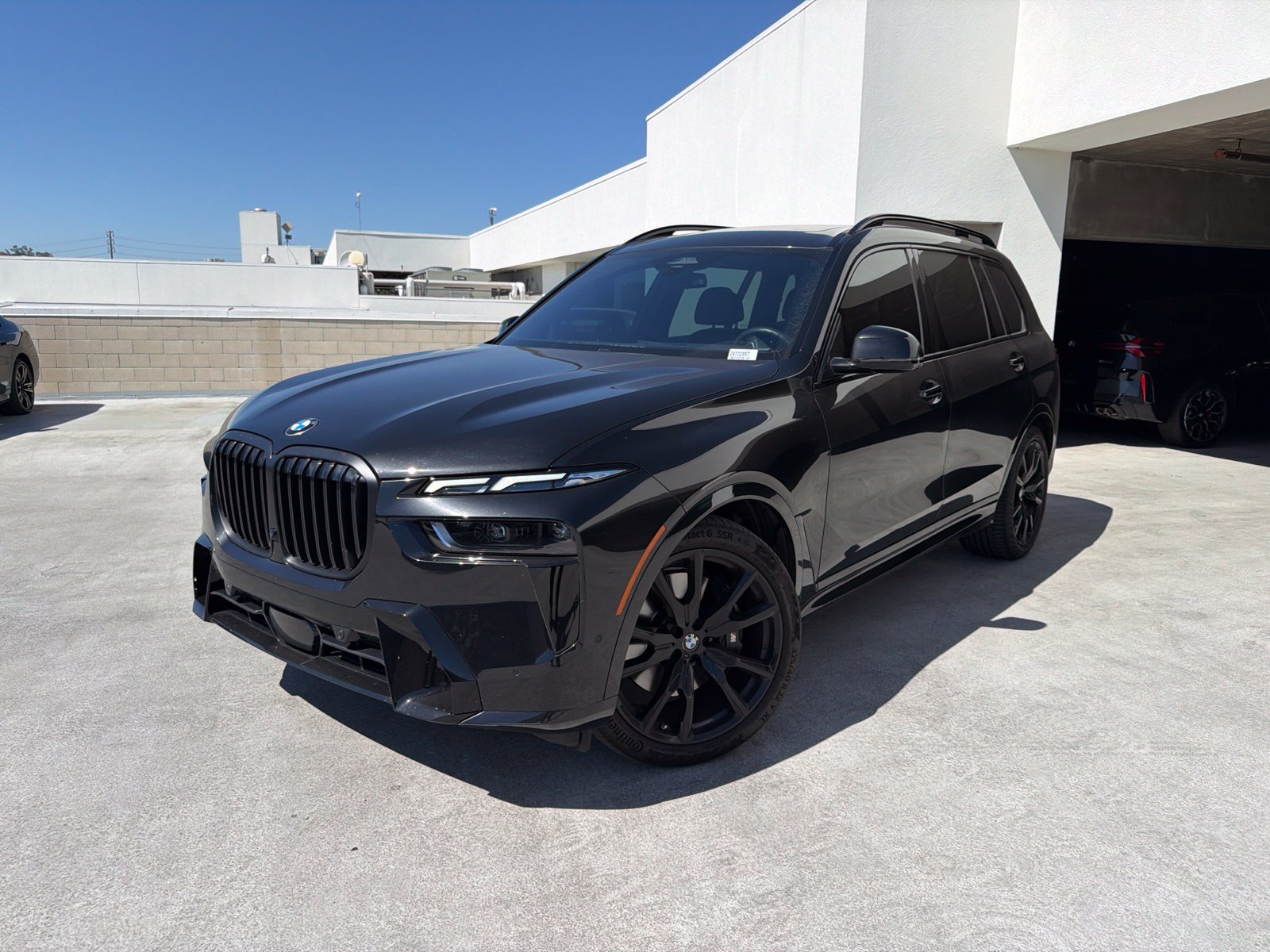 Certified Used 2026 Black Sapphire Metallic BMW xDrive40i image 3