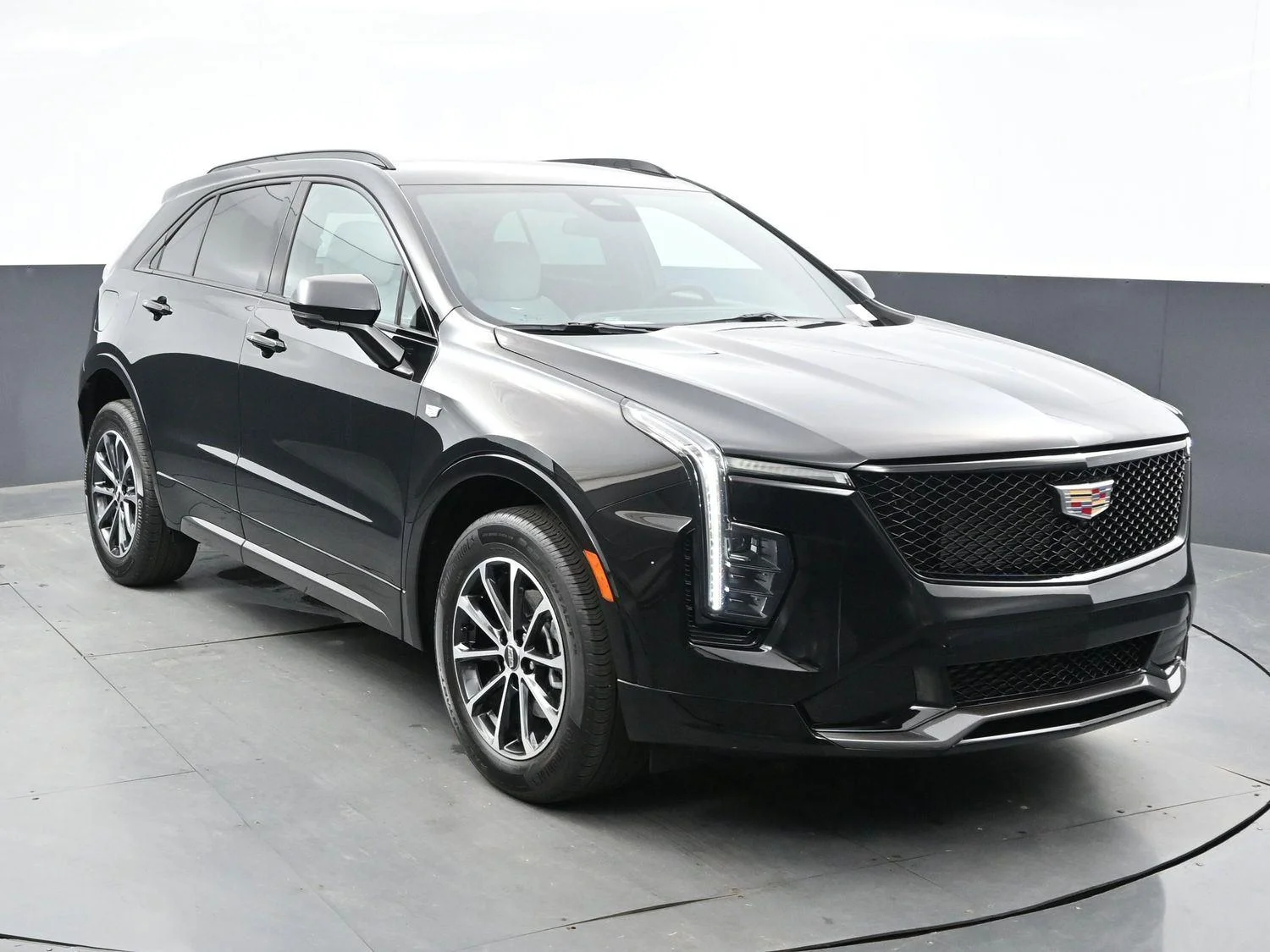 Used 2024 Stellar Black Metallic Cadillac Sport image 2