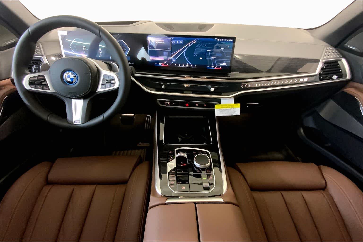 Used 2026 Mineral White Metallic BMW xDrive50e image 5