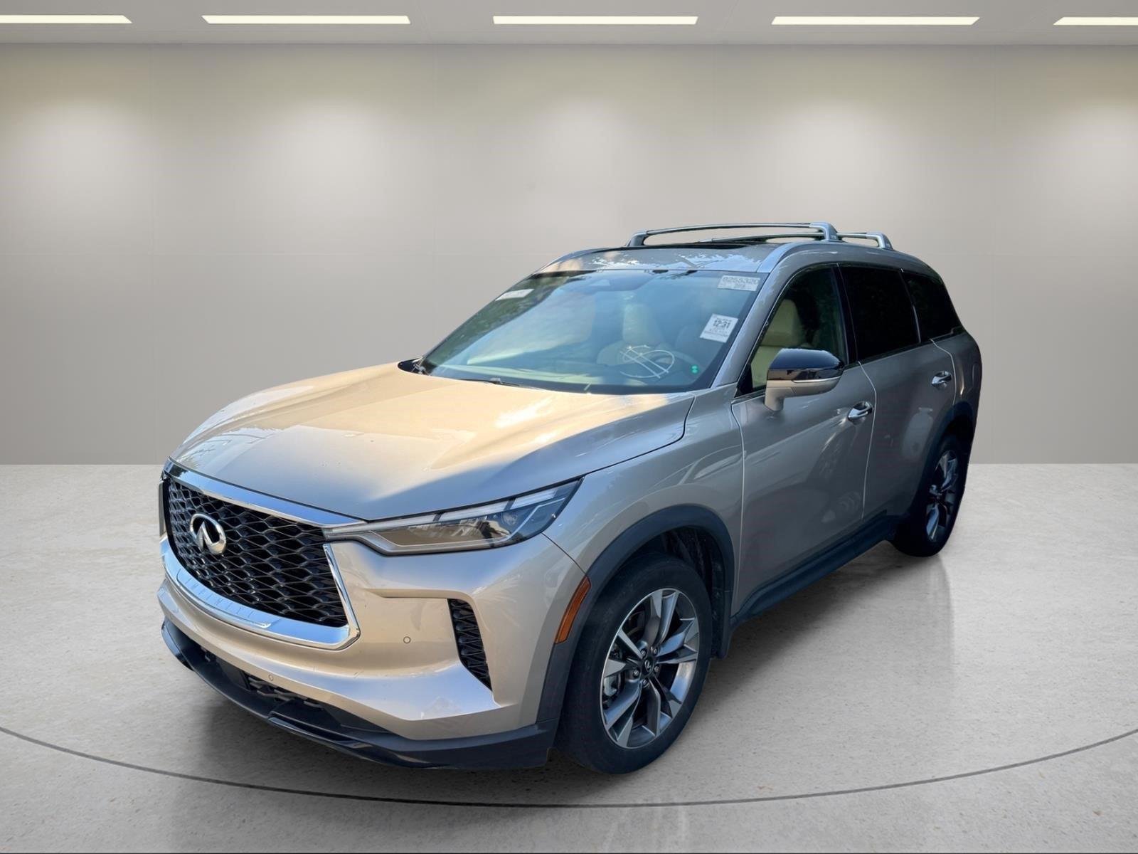 Used 2024 Warm Titanium INFINITI LUXE image 1