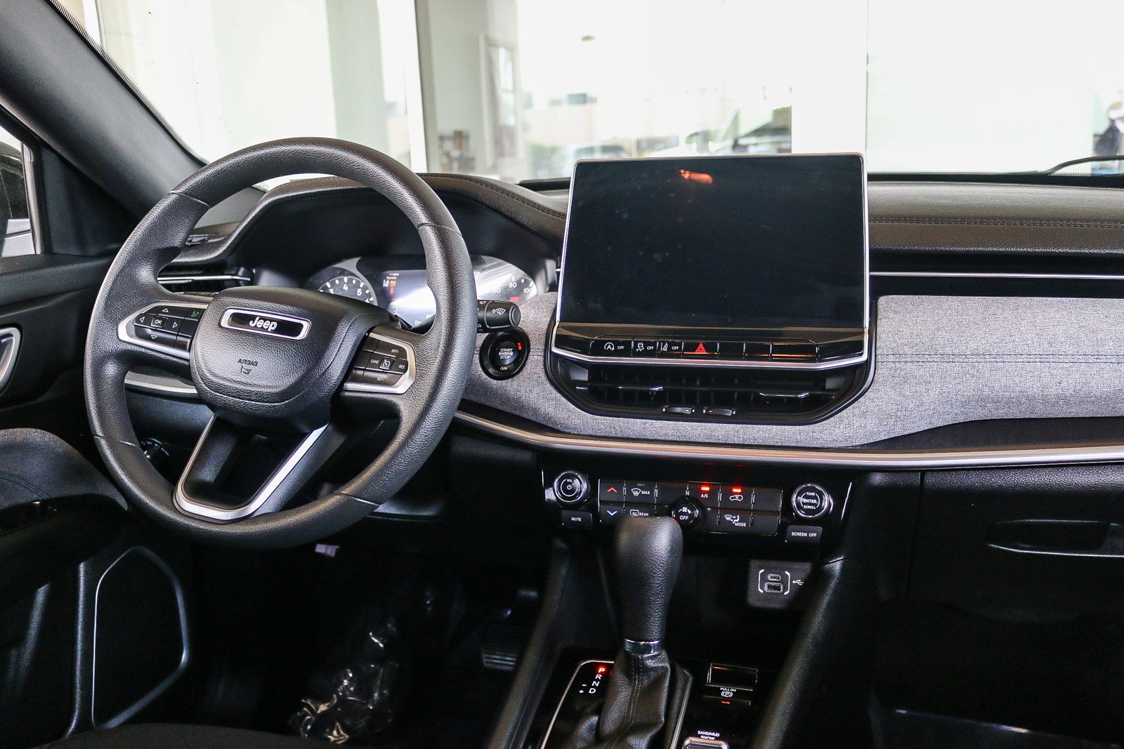 Used 2023 Granite Crystal Metallic Clearcoat Jeep Sport image 12