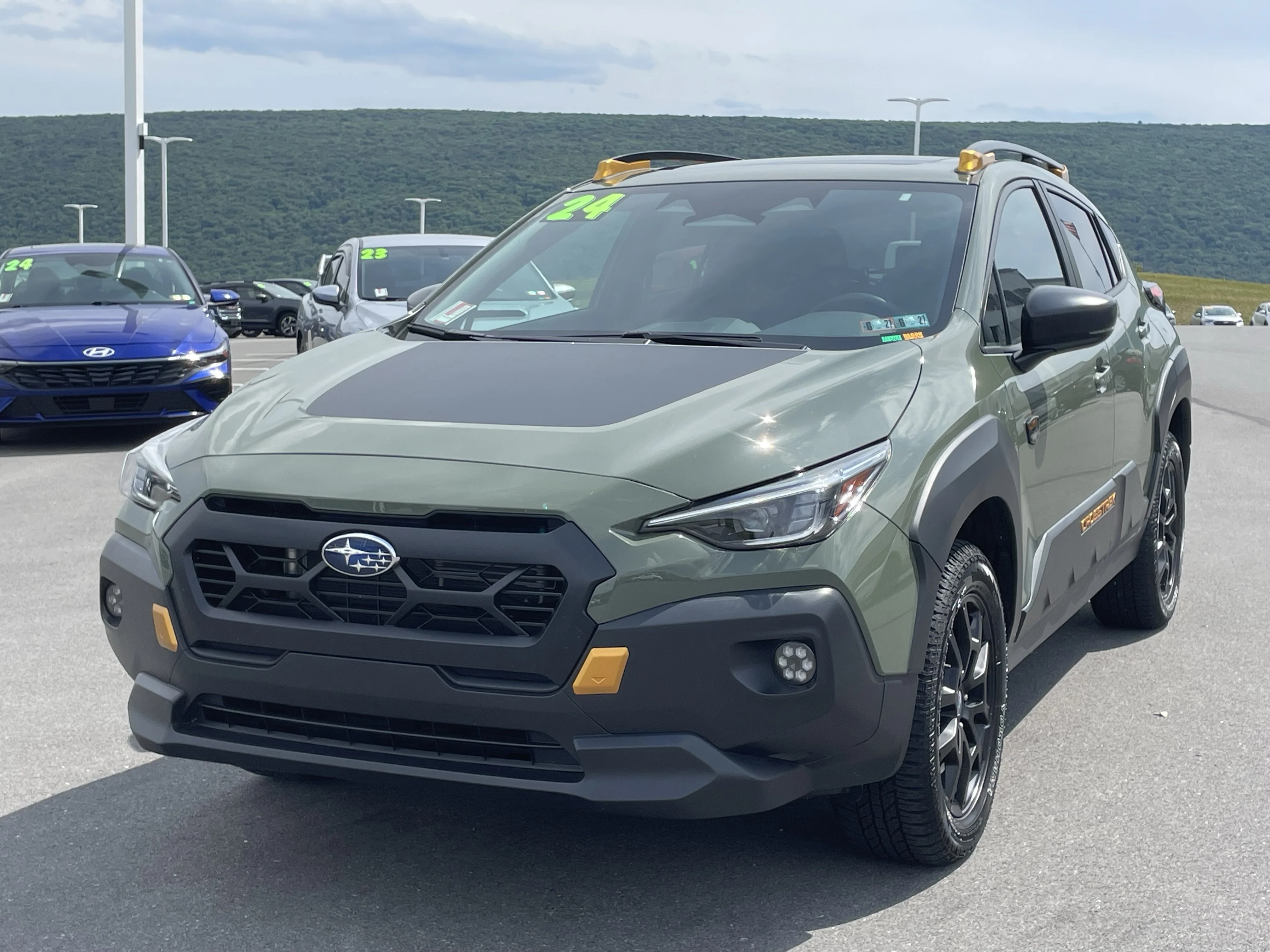 Used 2024 Alpine Green Subaru Wilderness image 8