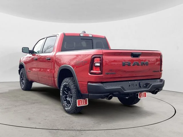 New 2026 Molten Red Ram REBEL CREW CAB 4X4 5