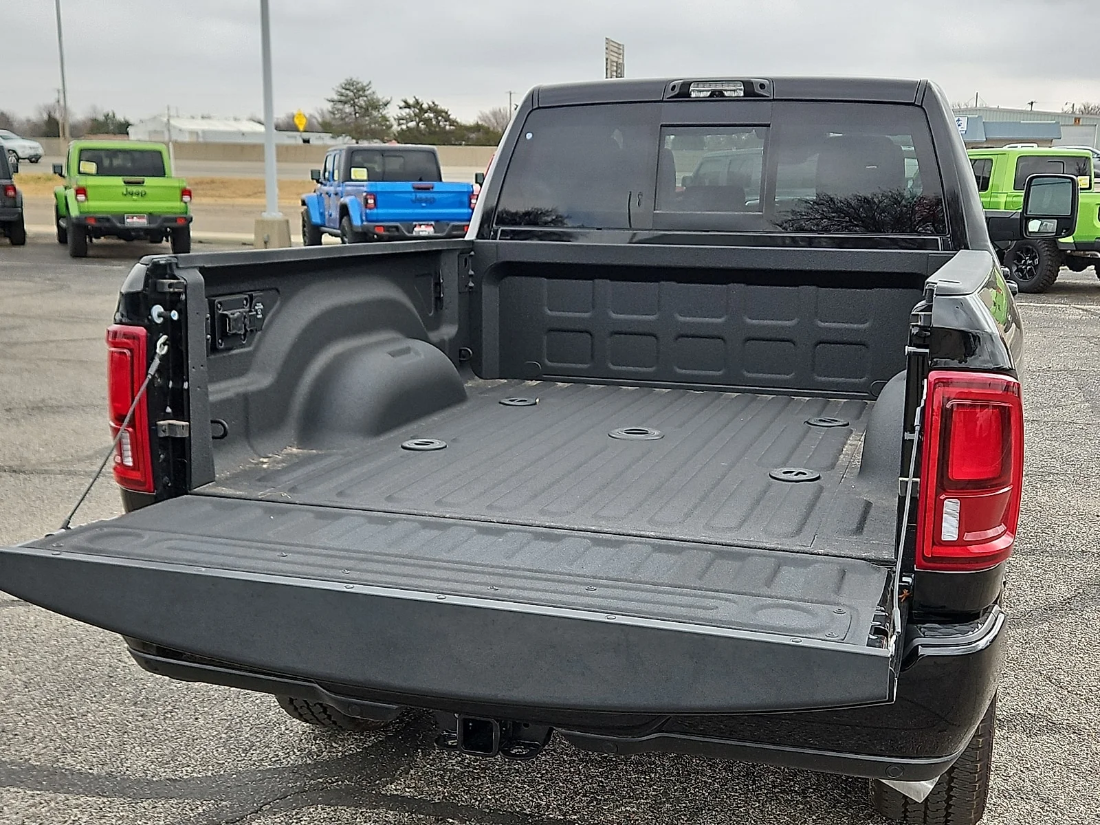 New 2026 Diamond Black Crystal Pearlcoat Ram LARAMIE CREW CAB 4X4 6