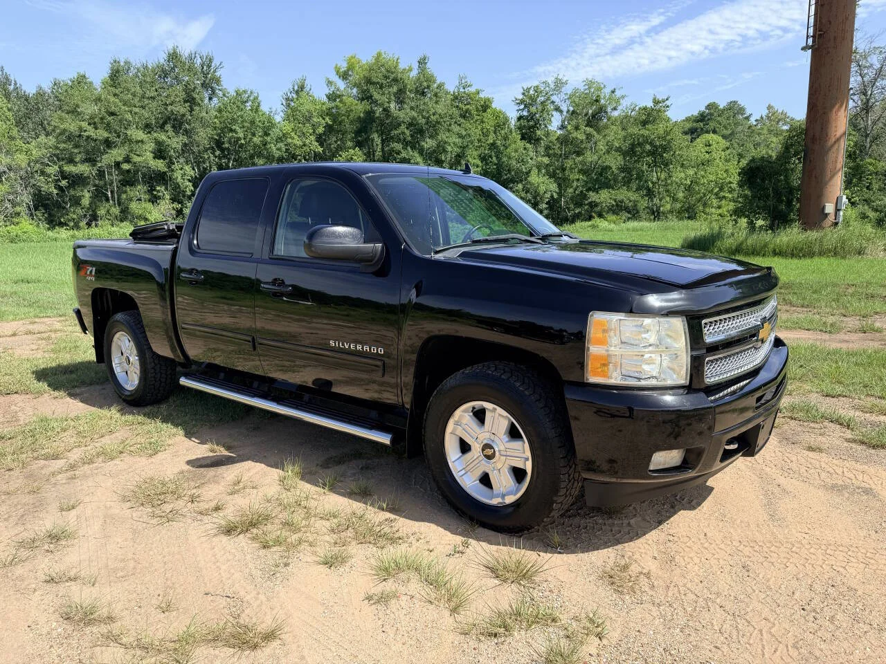 Used 2013 Black Chevrolet LTZ 4x4 4dr Crew Cab 5.8 ft. SB image 7