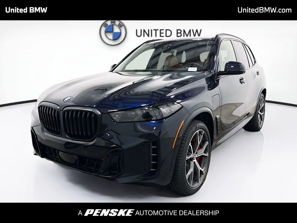 New 2026 Carbon Black Metallic BMW xDrive50e image 1