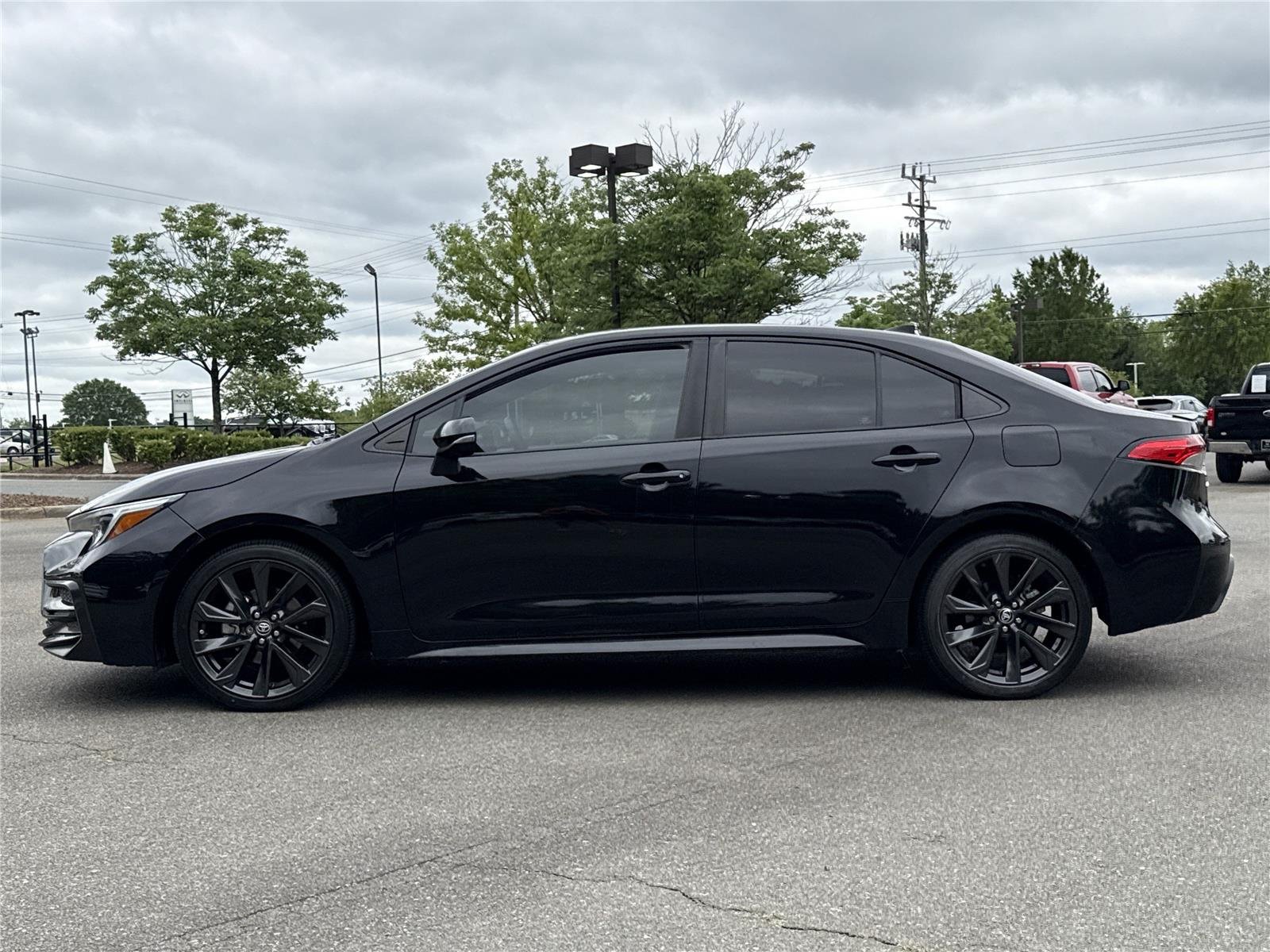 Used 2023 Midnight Black Metallic Toyota SE image 21