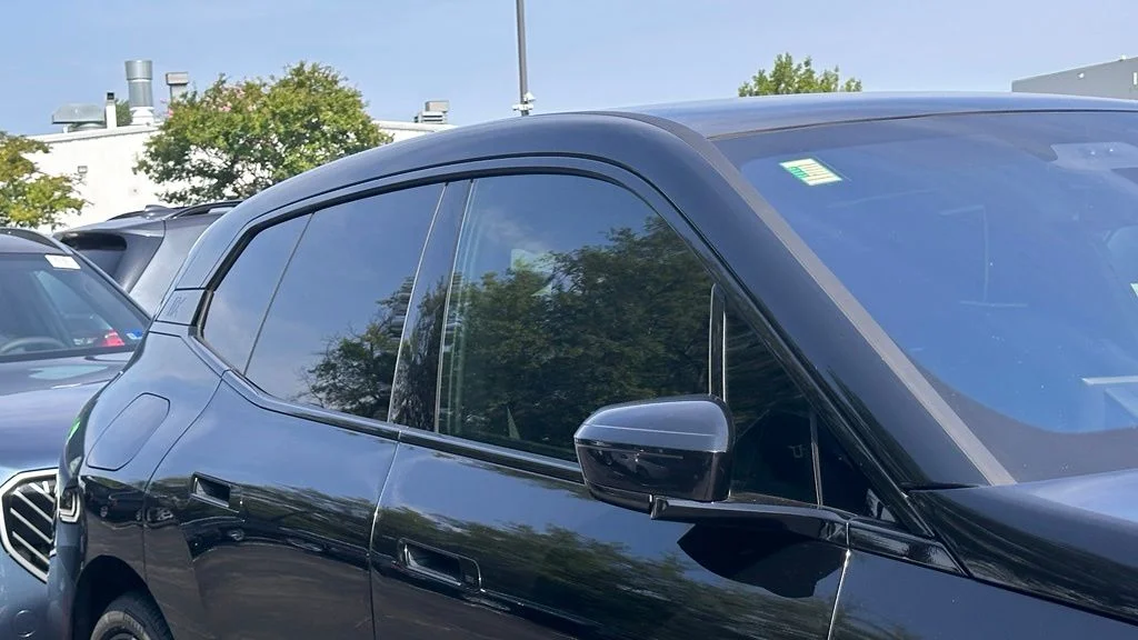 Used 2025 Black Sapphire Metallic BMW xDrive50 image 3