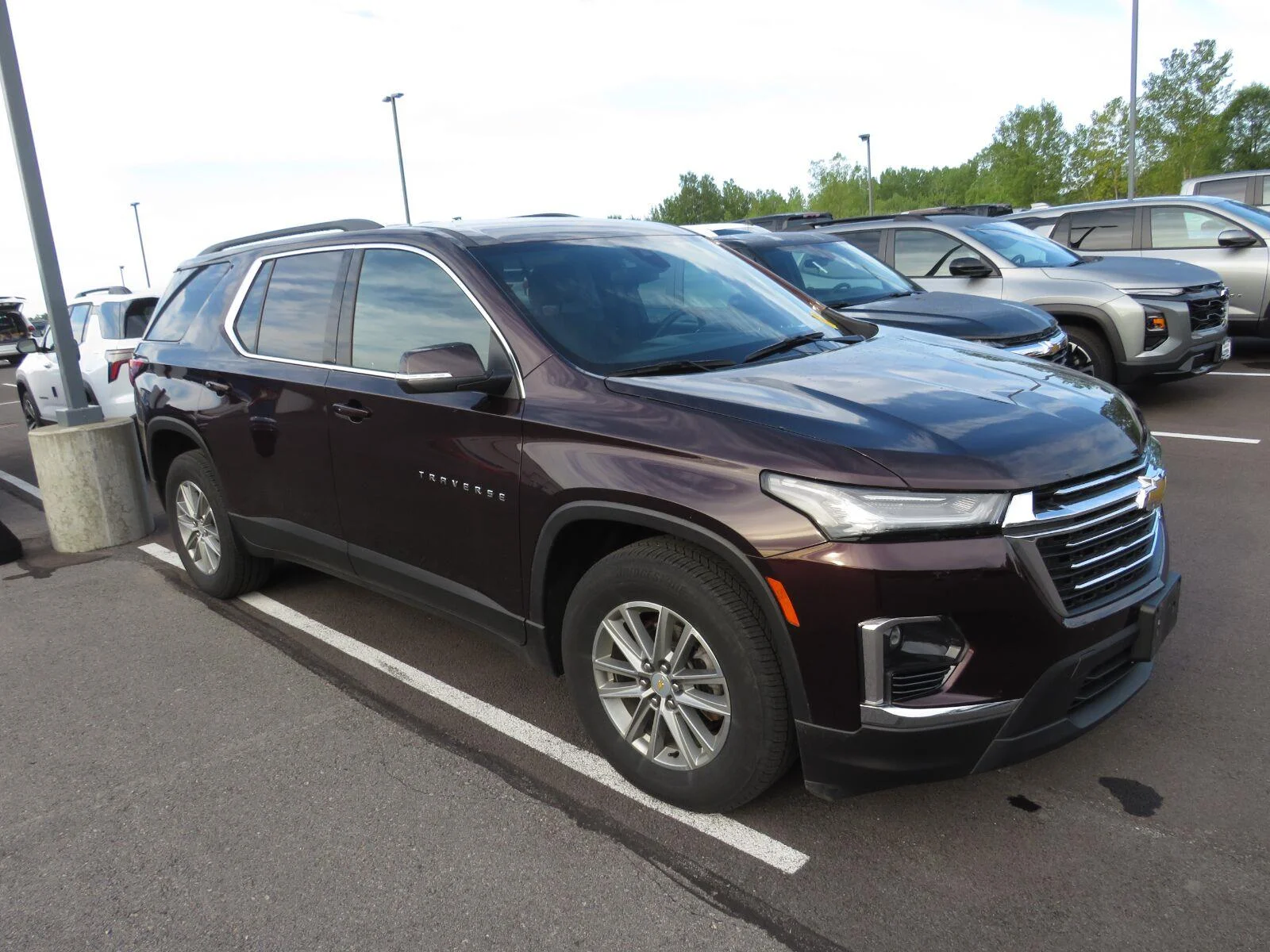 Used 2023 BLACK CHERRY METALLIC Chevrolet LT Cloth image 2