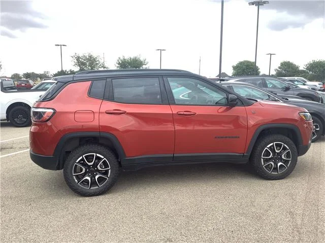 Used 2025 Red Hot Pearlcoat Jeep Trailhawk 4x4 image 9