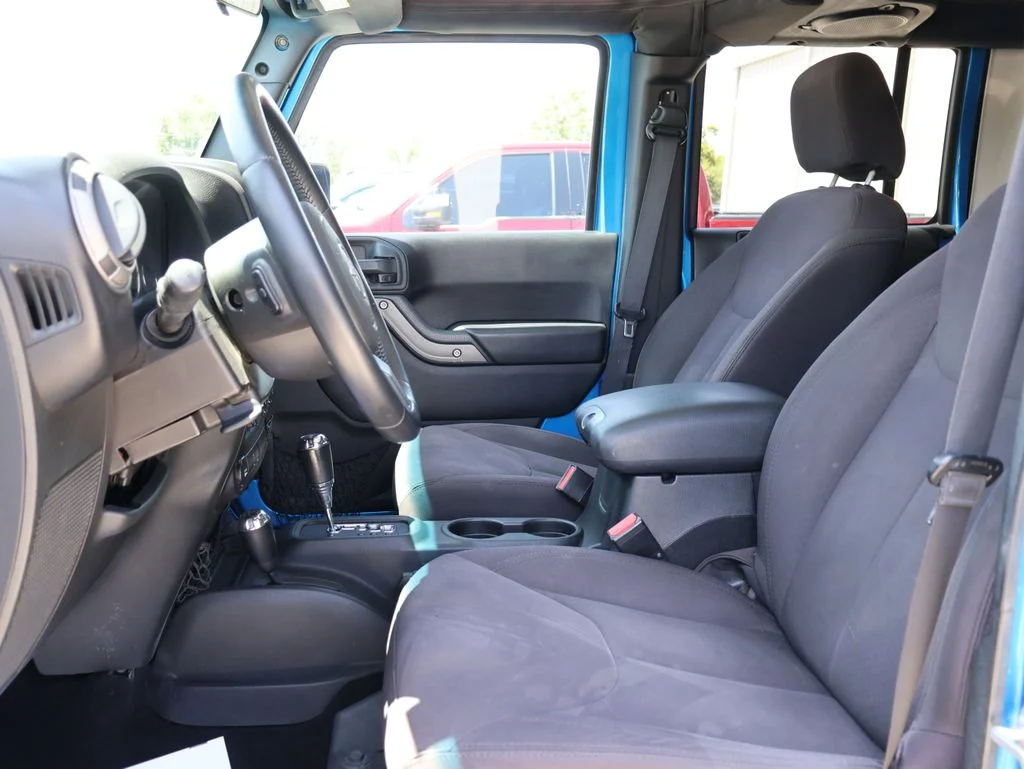 Used 2014 Blue Jeep Unlimited Sport image 22