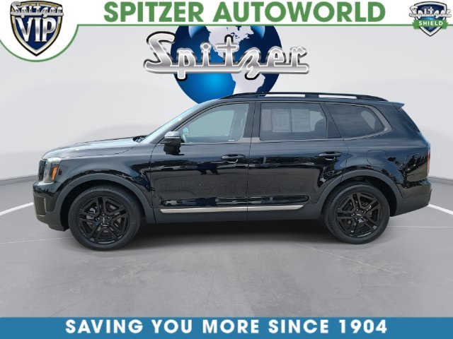 Used 2023 Ebony Black Kia EX X-Line image 6
