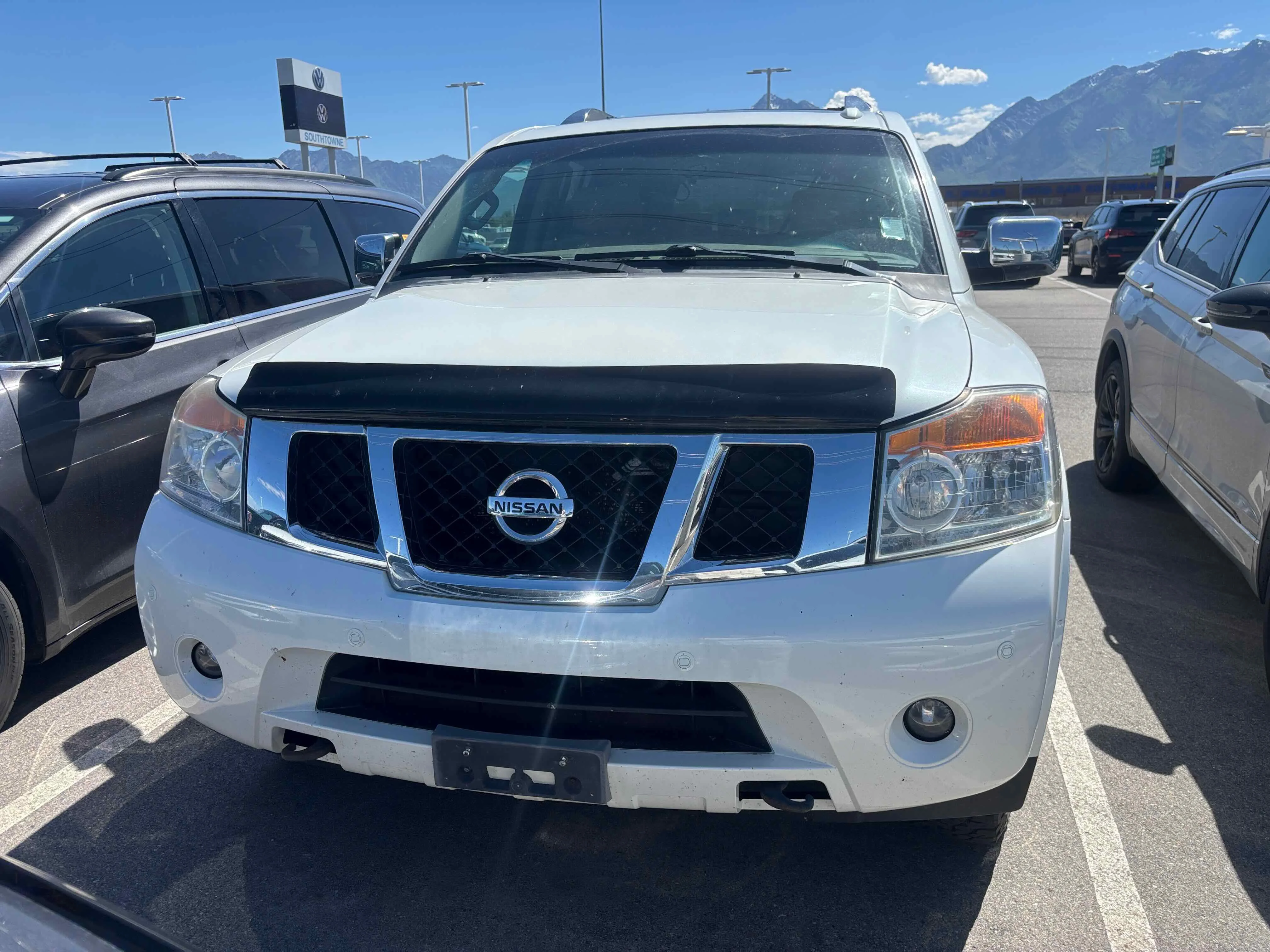 Used 2013 Pearl White Nissan Platinum image 2