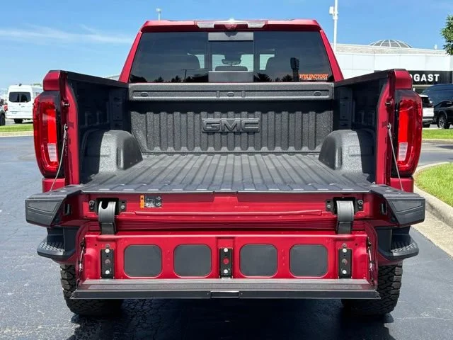 New 2026 VOLCANIC RED TINTCOAT GMC AT4 image 12