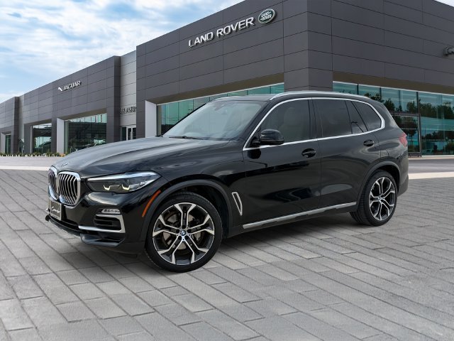 Used 2021 Black BMW sDrive40i image 1