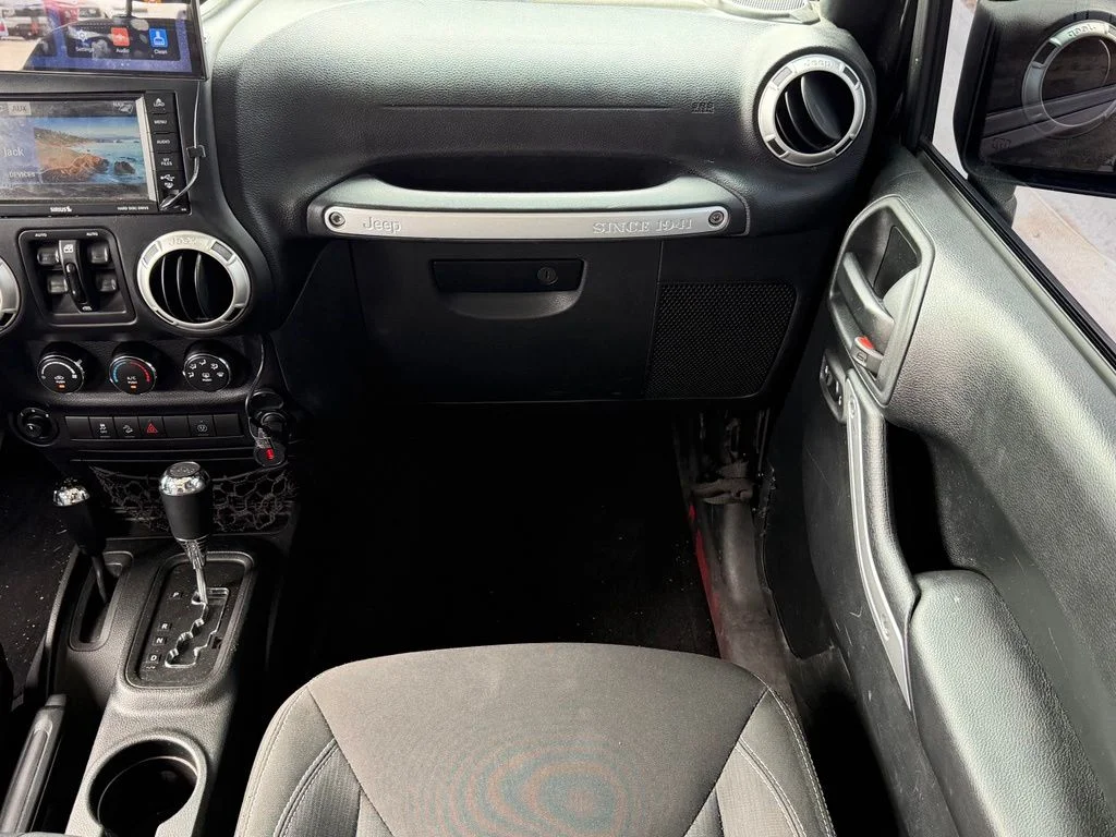 Used 2018 Black Jeep Unlimited Sahara image 11