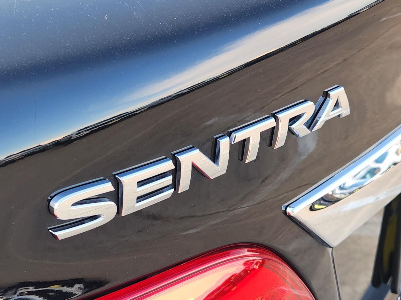 Used 2016 Super Black Nissan SV image 12