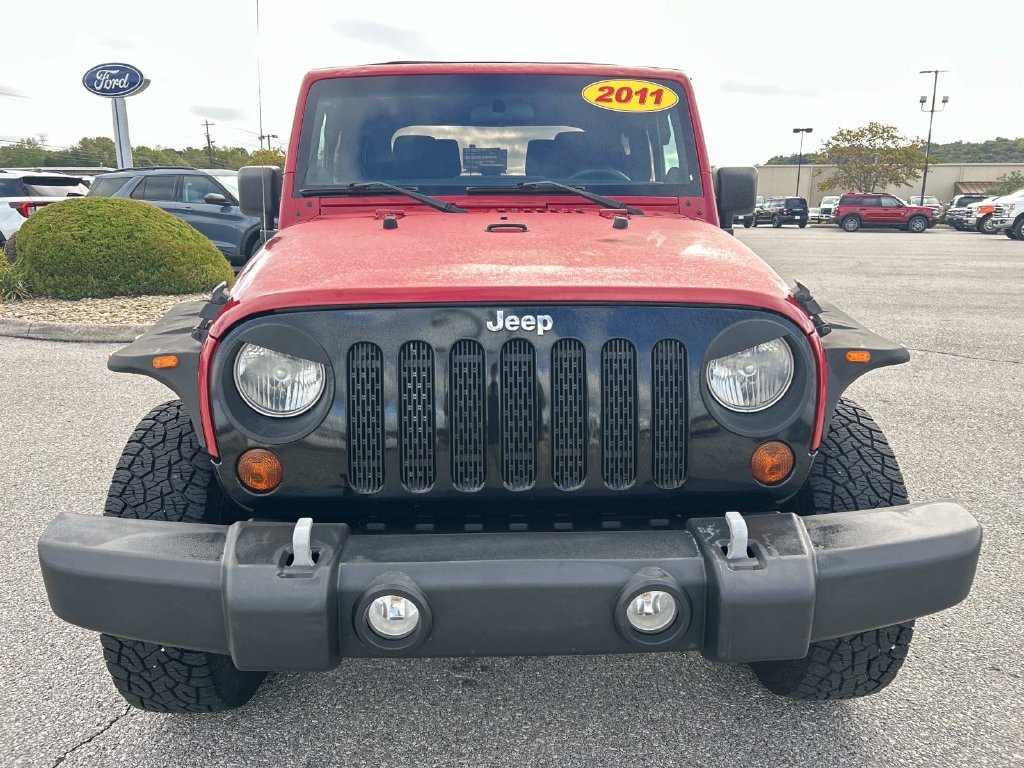 Used 2011 Flame Red Jeep Sport image 9