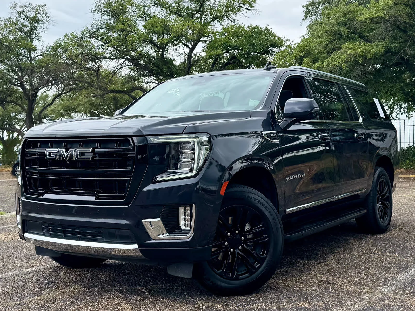Certified Used 2024 Titanium Rush Metallic GMC SLT image 1