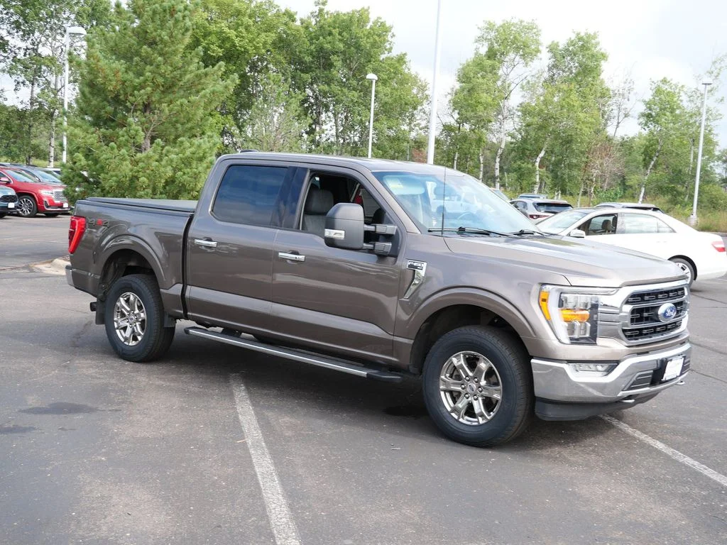 Used 2021 Ford F-150 XLT with VIN 1FTFW1E83MKE89145 for sale in Minneapolis, Minnesota
