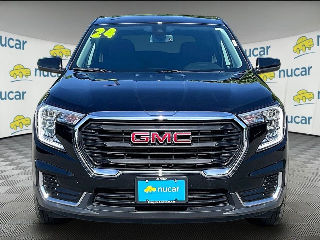 Used 2024 Black GMC SLE image 2