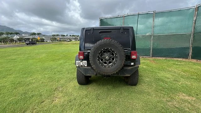 Used 2012 Black Jeep Sahara image 4