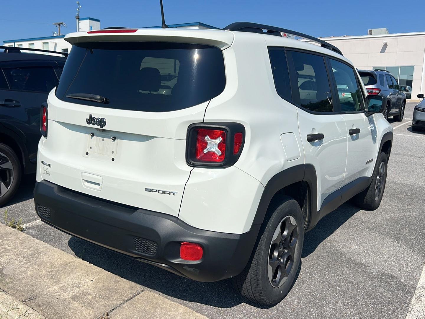 Used 2018 Alpine White Jeep Sport image 4