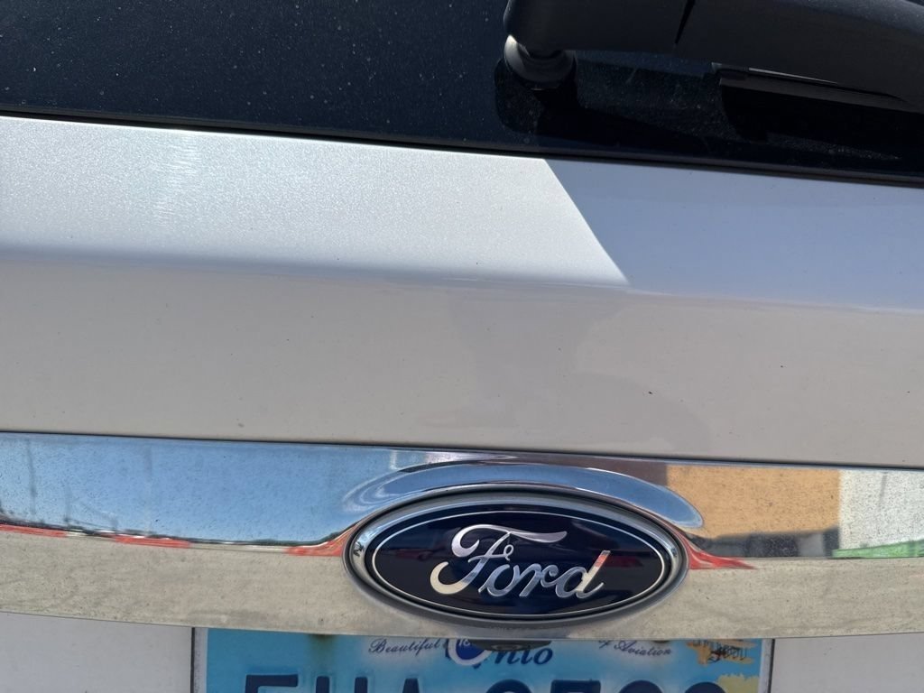 Used 2013 White Platinum Ford SEL image 4