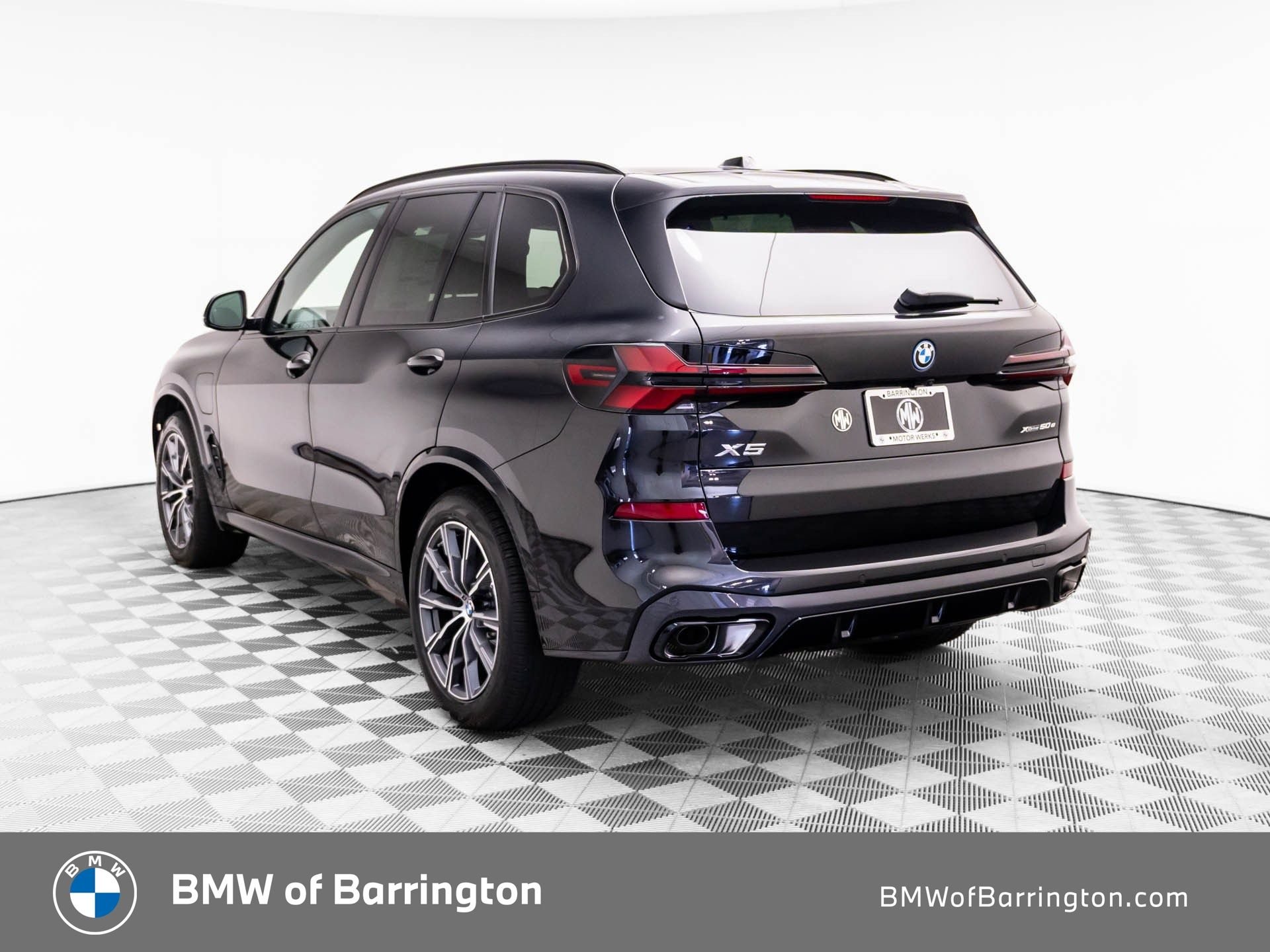 New 2026 Black Sapphire Metallic BMW xDrive50e image 3