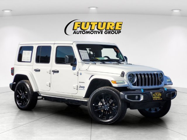 Used 2024 White Jeep Sahara 4xe image 1