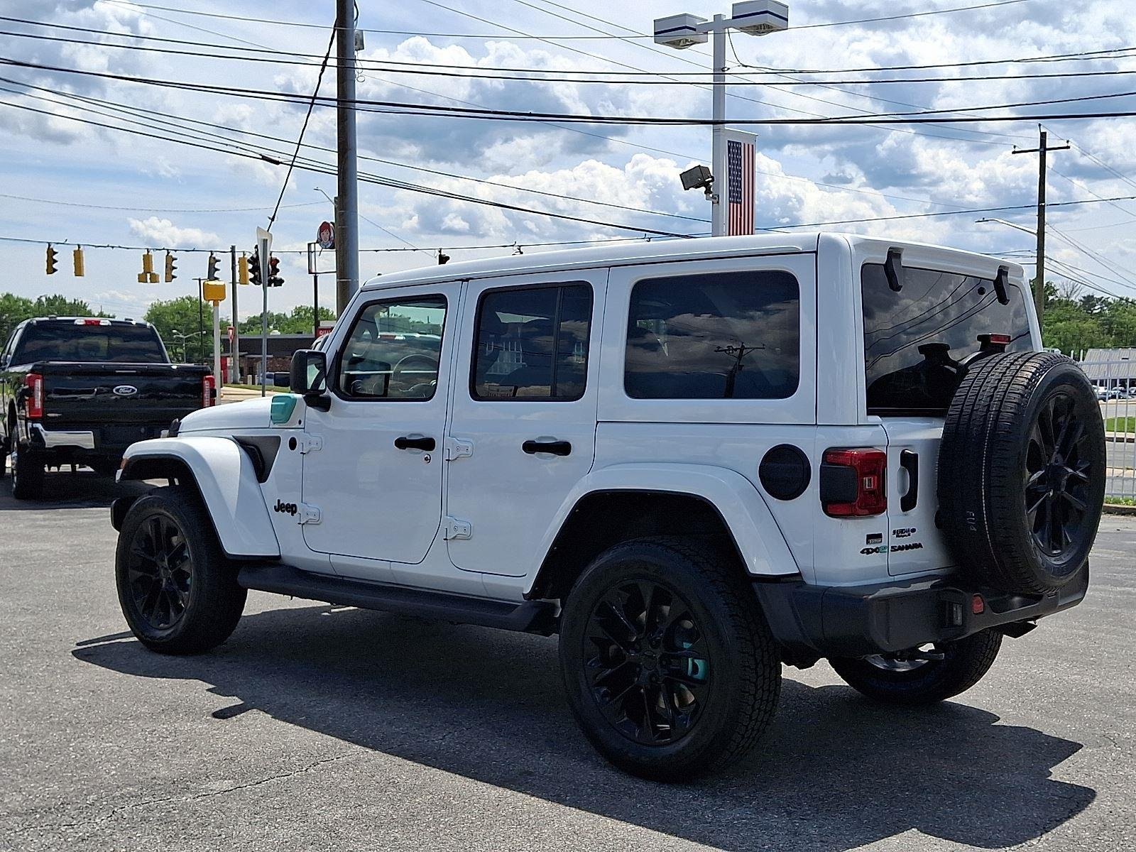Used 2021 Bright White Clearcoat Jeep Unlimited Sahara image 4
