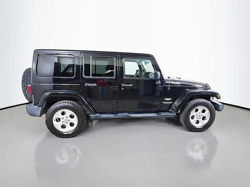 Used 2015 Black Jeep Unlimited Sahara image 5