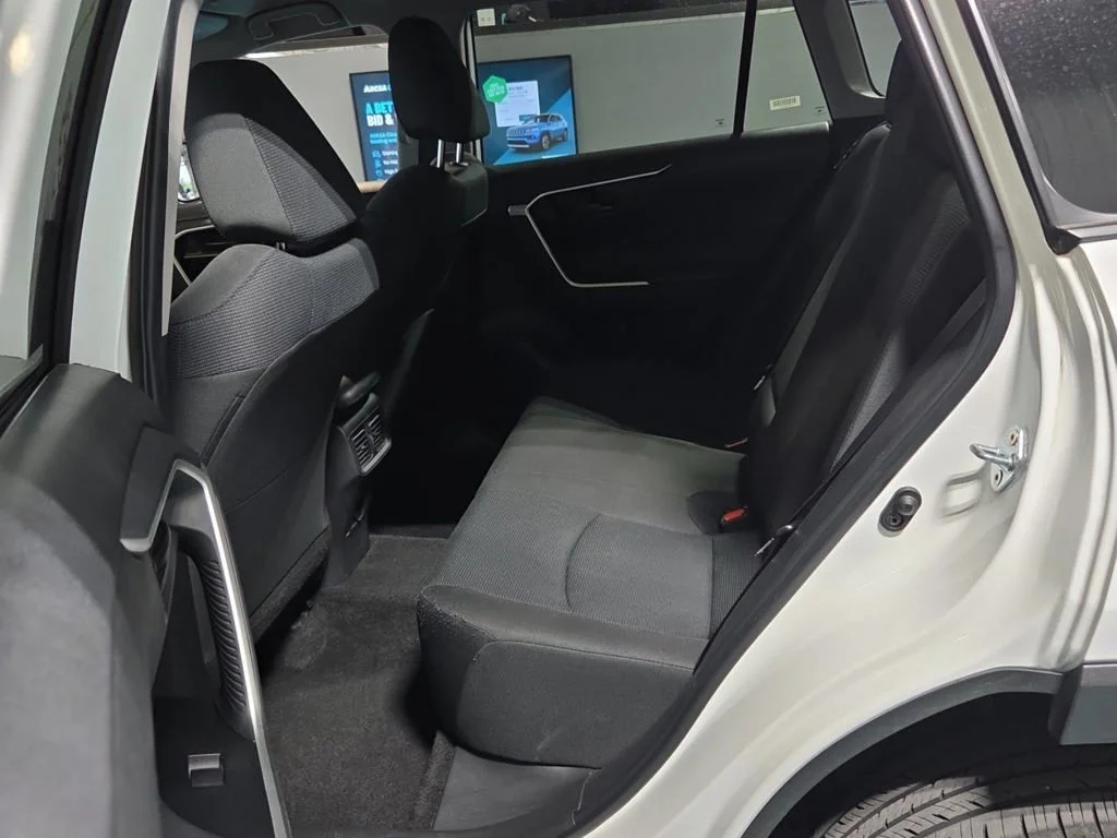 Used 2025 White Toyota LE image 2