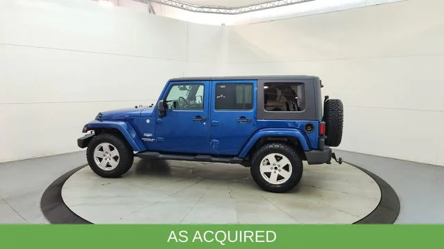 Used 2010 Blue Jeep Unlimited Sahara image 6