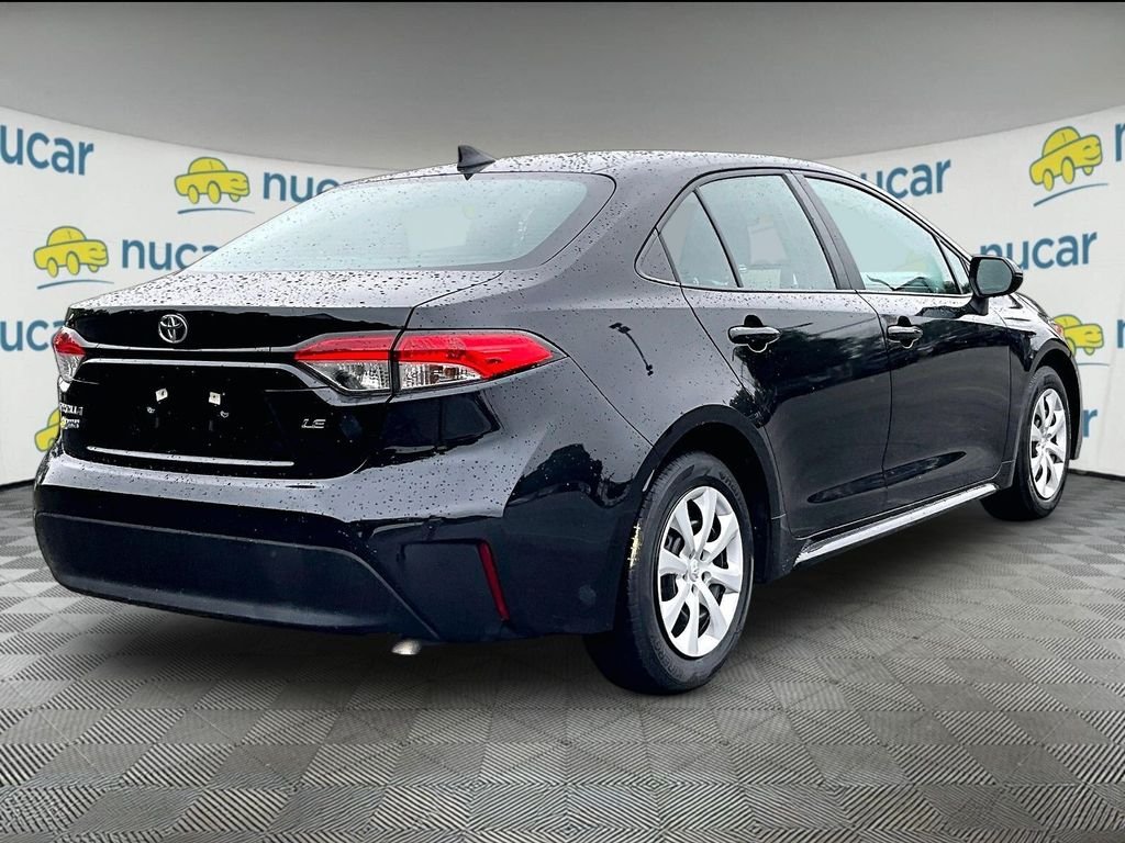 Used 2024 Black Toyota LE image 6