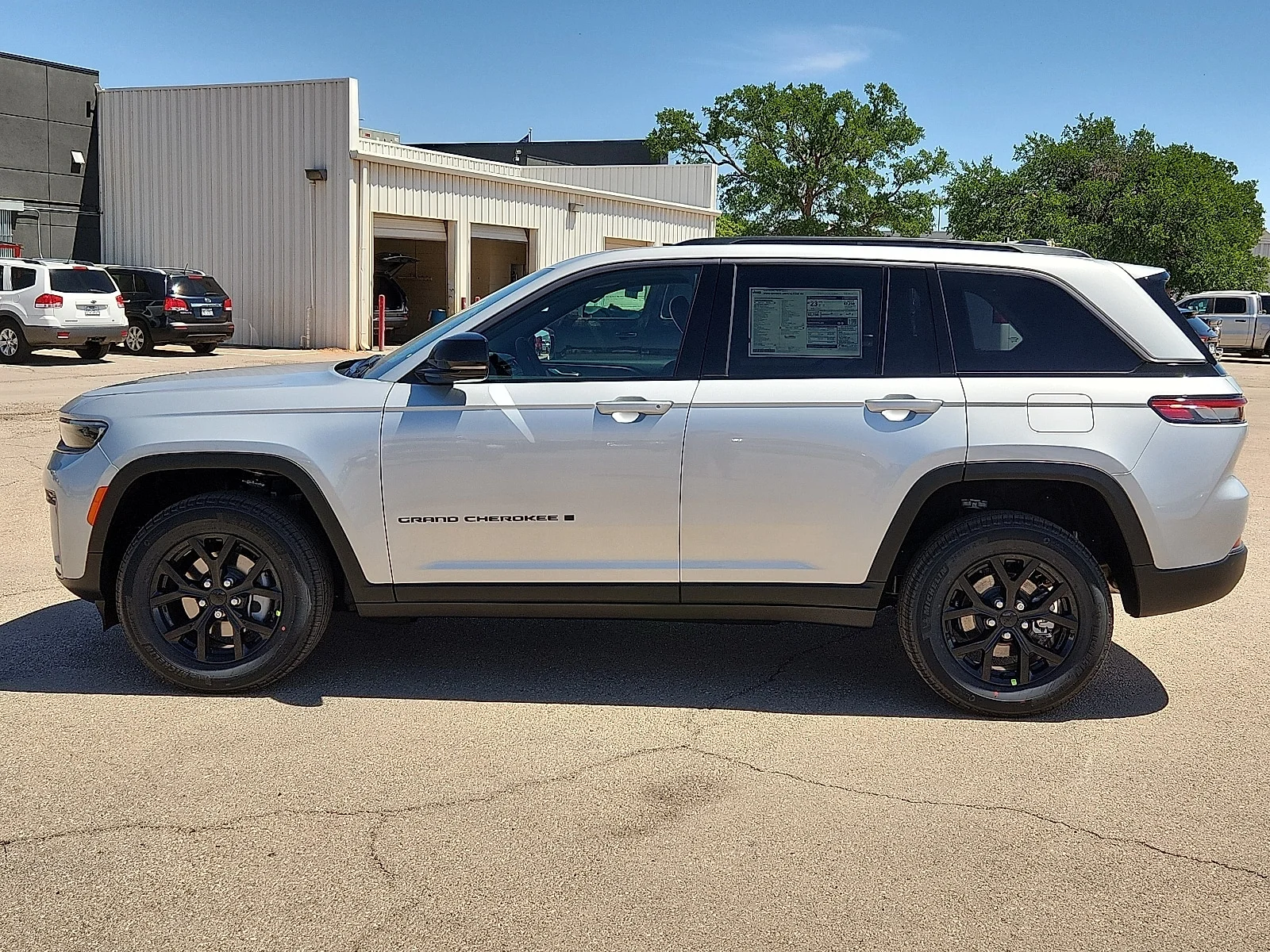 New 2026 Silver Zynith Jeep LAREDO ALTITUDE 4X4 image 2