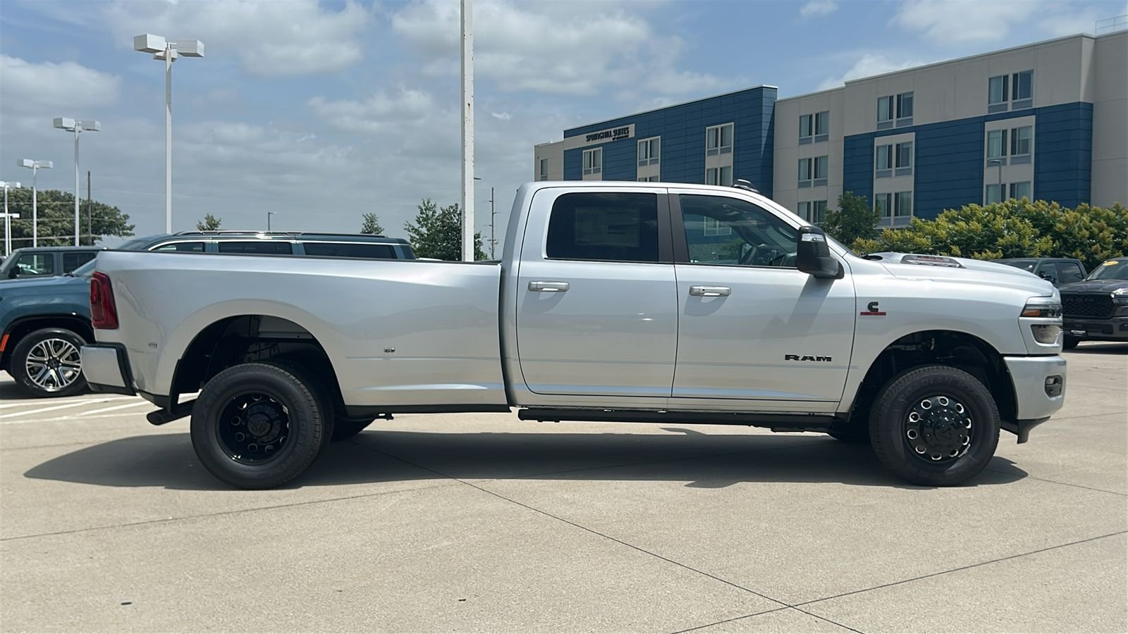 New 2026 Silver-Zynith Exterior Paint RAM Laramie image 3