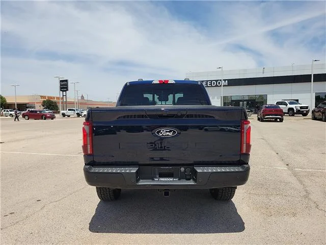 Used 2024 Antimatter Blue Metallic Ford Platinum 4x4 SuperCrew Cab 5.5 ft. box 145 in. WB image 3