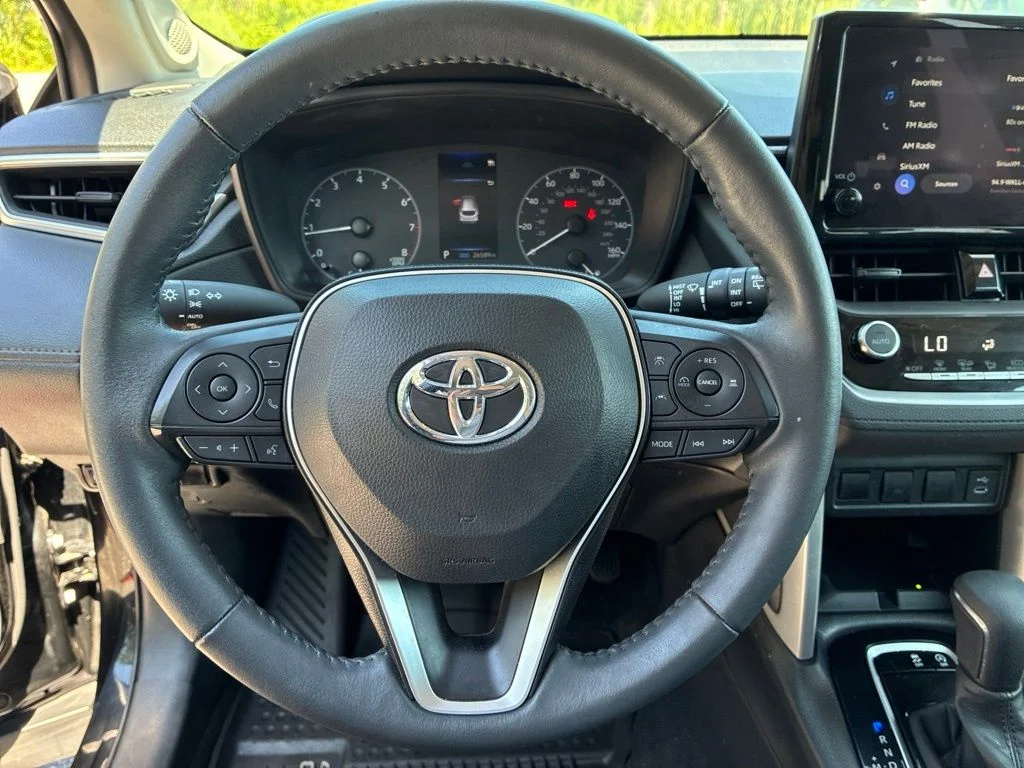 Used 2024 Black Toyota LE image 22