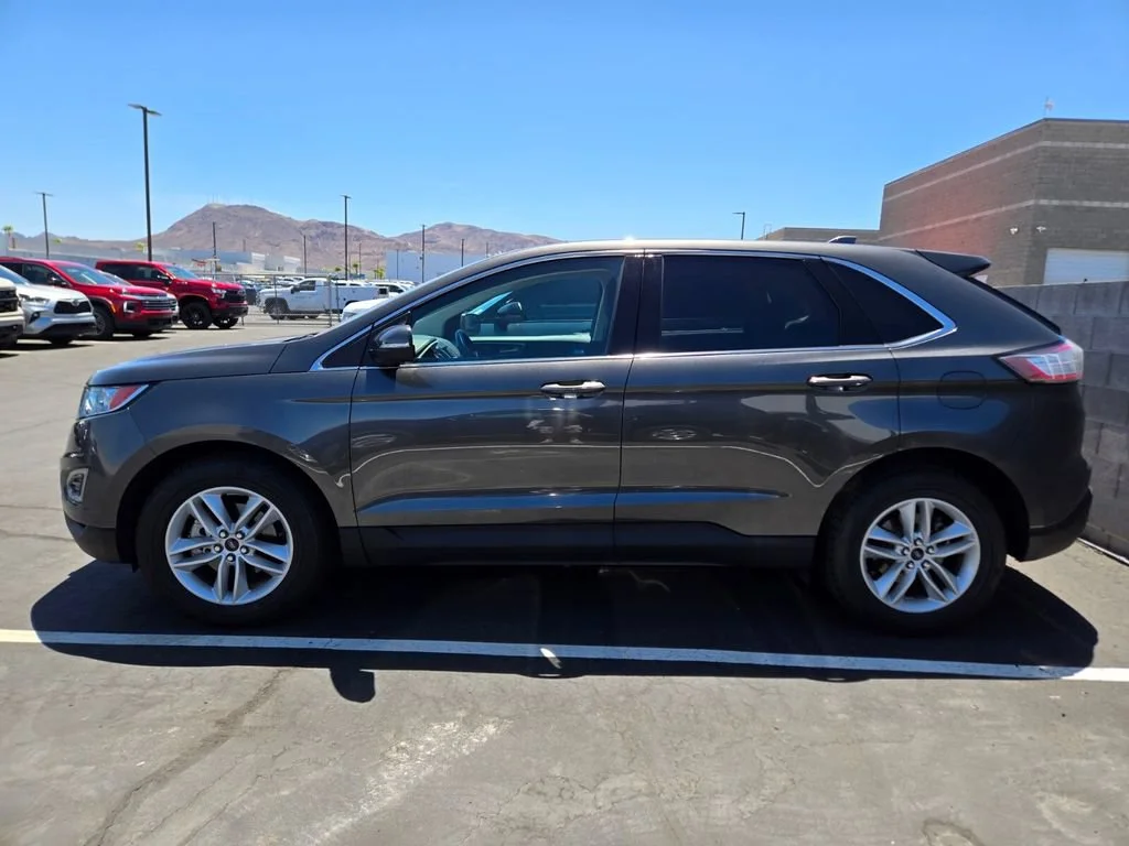 Used 2018 Magnetic Metallic Ford SEL image 3