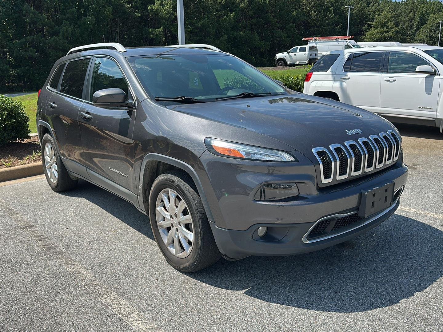 Used 2017 Granite Crystal Metallic Clearcoat Jeep Limited image 1