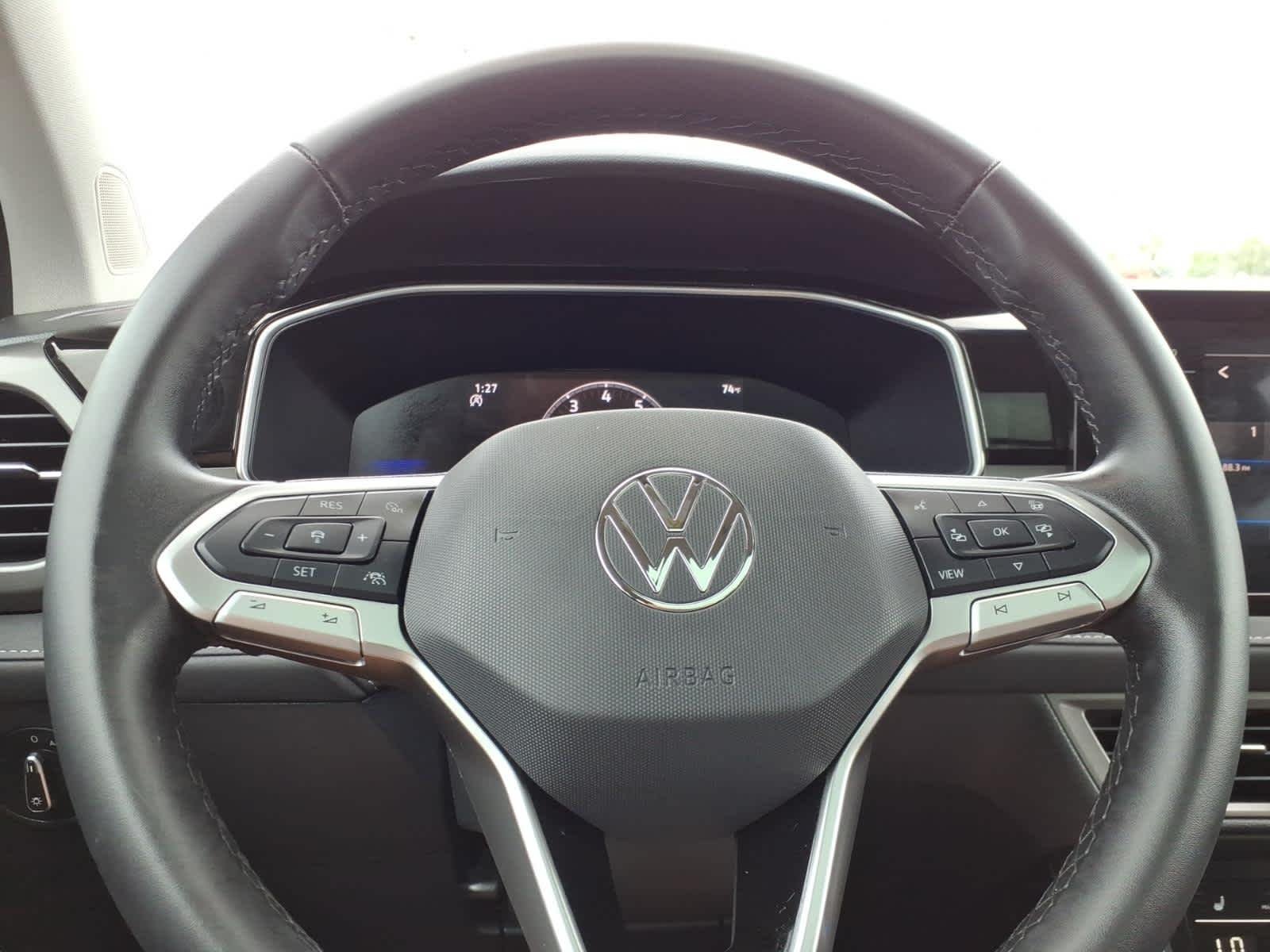 Certified Used 2025 Pure White w/Deep Black Roof Volkswagen SE Black image 24
