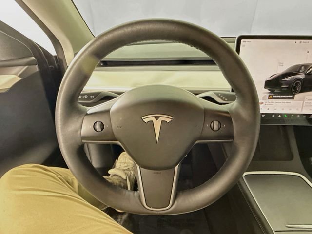 Used 2023 Solid Black Tesla Performance image 10