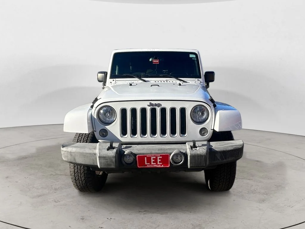 Used 2018 Bright White Jeep Unlimited Sahara 4x4 image 9