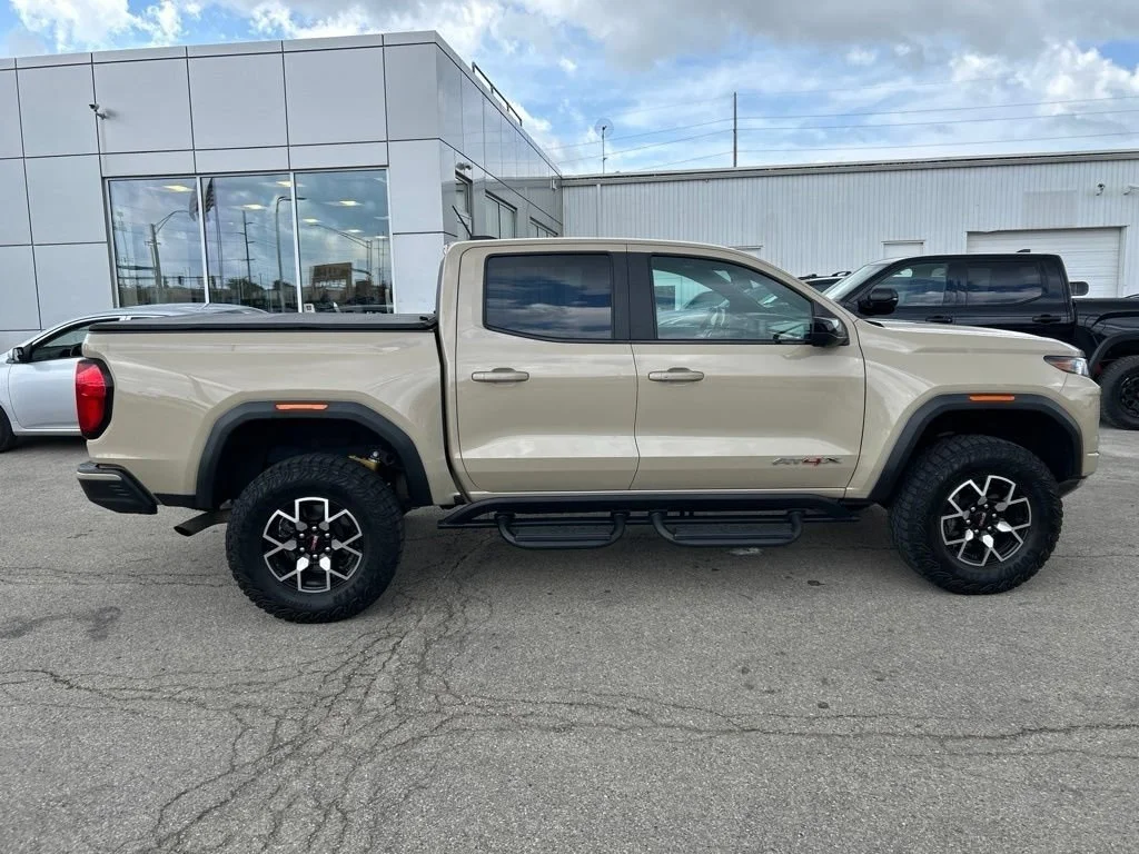 Used 2023 Desert Sand Metallic GMC AT4X image 3