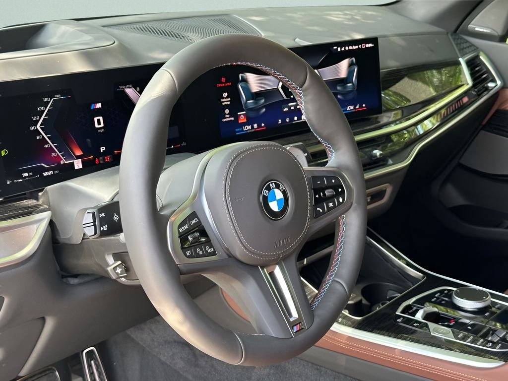 New 2026 Black Sapphire Metallic BMW M60i image 13